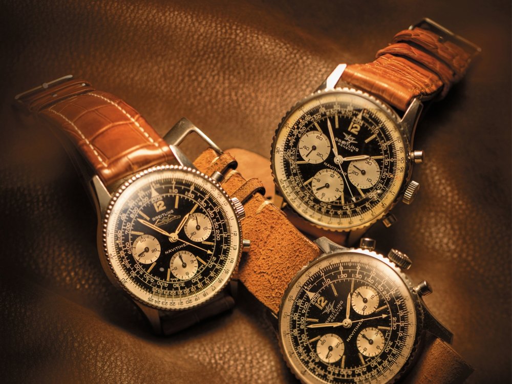 Frontansicht von drei historischen Modellen der Nativtimer-Serie von Breitling.