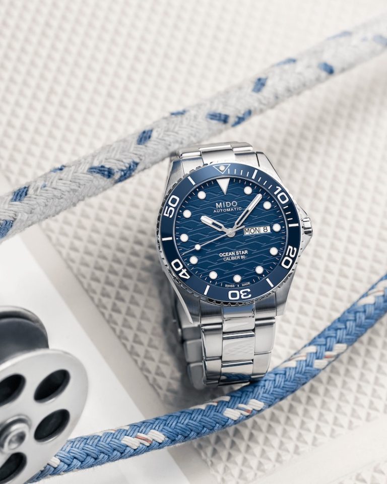 MIDO Ocean Star 200C auf weißem Untergrund neben Seilen