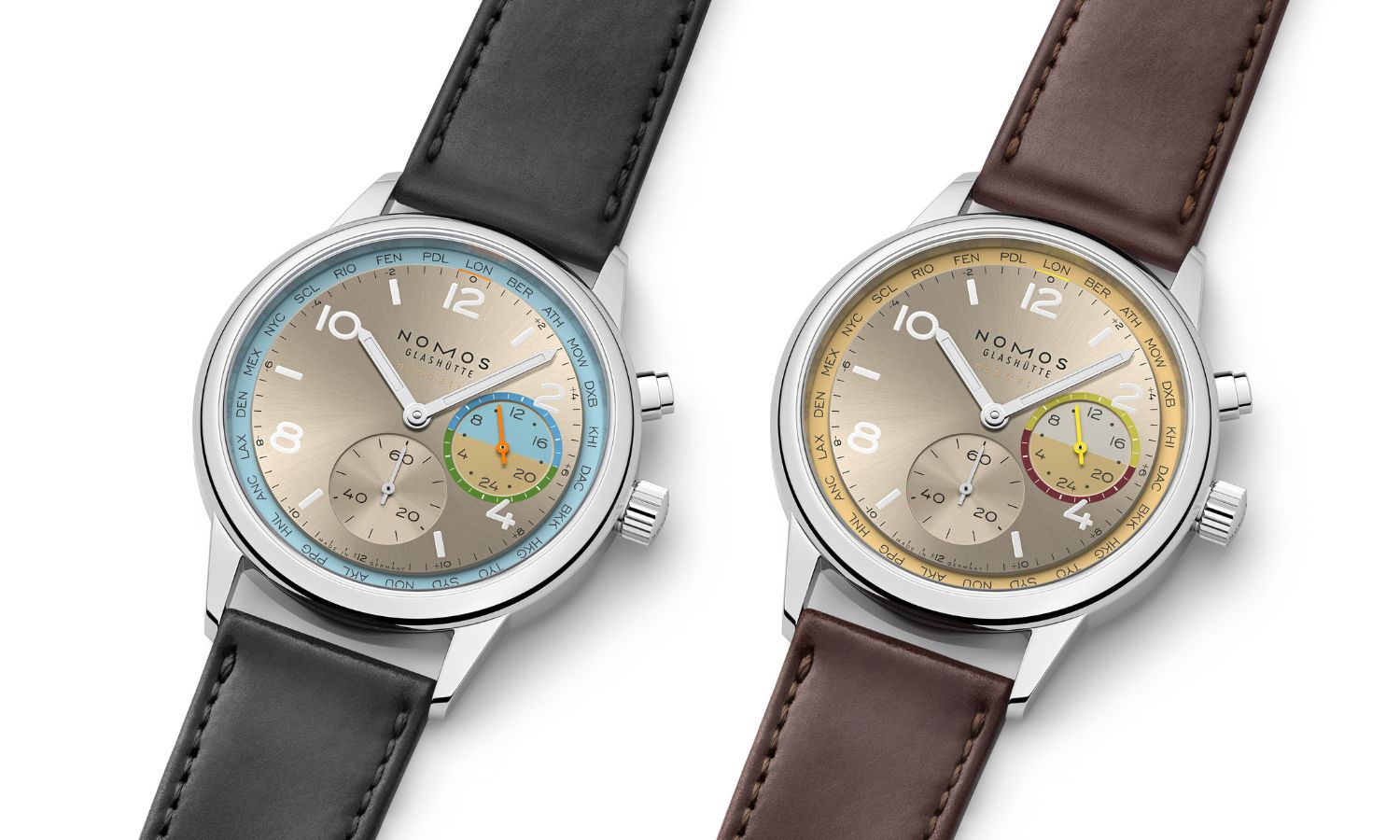 NOMOS Glashütte Club Sport neomatik Weltzeit Roam (Ref. 790.S10) und Club Sport neomatik Weltzeit Reverie (Ref. 790.S11) nebeneinander liegend vor weißem Hintergrund abgebildet